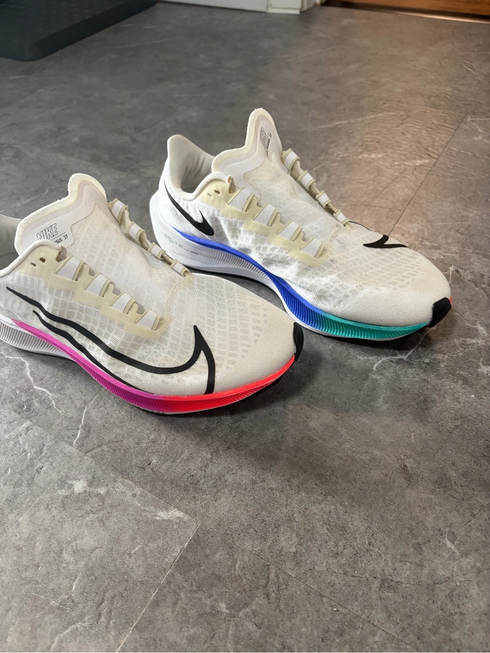 Nike Pegasus Running Shoes with Pink and Teal Gradient Soles